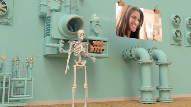 3D industrial environment with picture of woman drinking milk beside a skeleton giving a thumbs up.