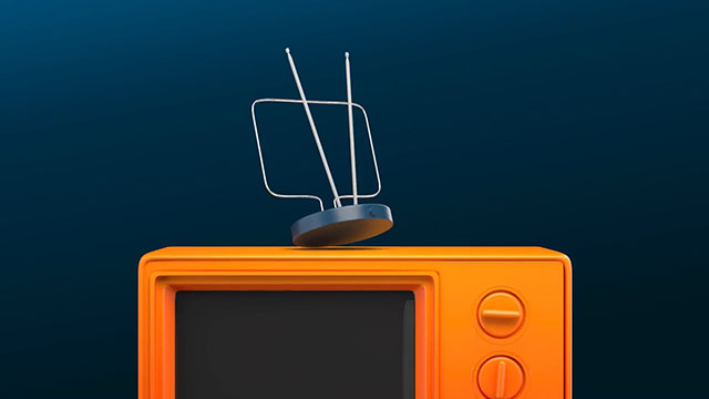 An orange TV with an aerial on a dark teal background.